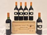 six bouteilles de vin de Bordeaux « Château Haut-Bellan » dans un coffret en bois