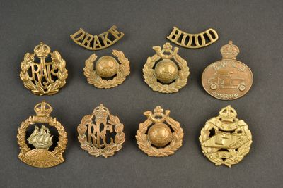 a close up of a bunch of badges on a table