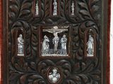 an old book with a picture of jesus on the cross and a crucifix
