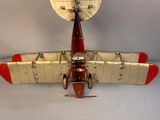a toy airplane that is sitting on top of a table