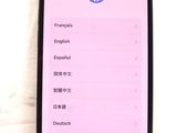 a cell phone with a list of foreign languages on the screen