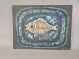 painting of a fish on a blue and green plate on a wall