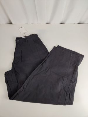 the pants are dark grey and have a small patch on the side