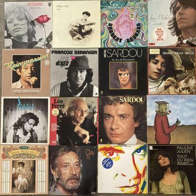 many different album covers on the wall of this room