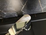 a close up of a bathroom sink with a chrome faucet