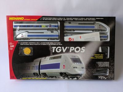 a toy train that is in the box on the table