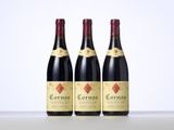 three bottles of wine sitting on top of a table next to each other