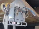 a picture of a machine that is on display in a building