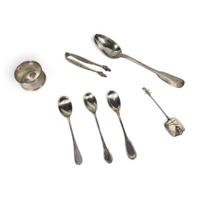several silver spoons and spoon spoons on a white surface