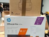 boxes of officejet pro printers are stacked on top of each other