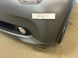a close up of a car with a sticker on the front of it