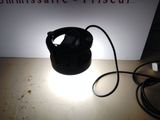 a lamp that is sitting on a table next to a box