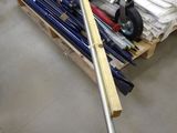 a pile of tools sitting on a pallet in a warehouse