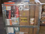 a metal cart with several boxes on it in a warehouse