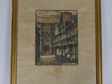 photo encadrée d'un bâtiment surmonté d'une horloge