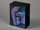 a black box with a picture of a snake inside of it