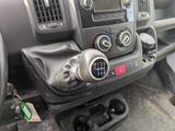 a close up of a car dashboard with a steering control