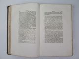 an open book that is sitting on a table