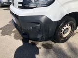 a white van that is parked in a parking lot