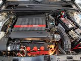 a car engine with a radiator in the hood