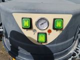 a close up of a machine with buttons on it