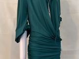 green draped dress on mannequin mannequin mannequin mannequin mannequin mannequin mannequin mannequin mannequin mann