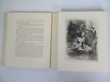 an open book with a drawing of a woman sitting on a bench