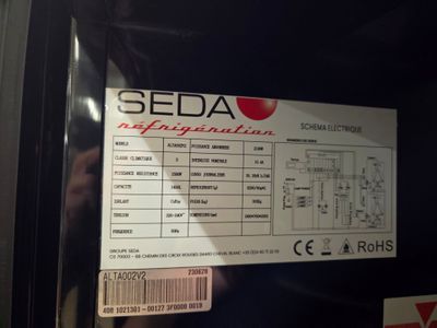 a picture of a sign on a door that says seda
