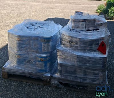 many stacks of plastic containers sitting on a pallet