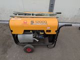 a small generator that is sitting on the ground