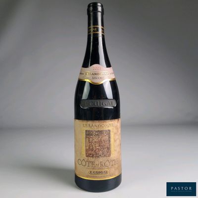 a bottle of wine that is sitting on a table