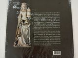 the back cover of a book with an image of a statue