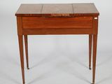 an early 20th century mahogany sewing table with two drawers