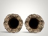 pair of antique silver plated candlesticks with black glass