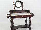 a small table with a mirror on top of it