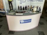 a counter with a bunch of figurines on top of it