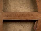 a close up of a wooden shelf with a clock on it