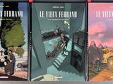 three books that are sitting on a table