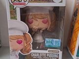two pop vinyl figures of a woman in a white hat and a woman in a white dress