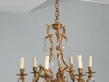 a chandelier that is hanging from the ceiling