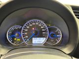 a close up of a car dashboard with a speedometer