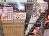 a metal cage with a bunch of items inside of it