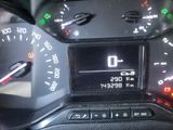 a close up of a car dashboard with a speedometer