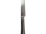a knife that is sitting on top of a table
