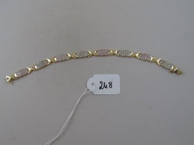 a close up of a bracelet with a price tag attached to it