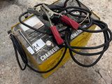 a small yellow box with a bunch of wires on it