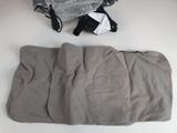a bag and a pair of shoes on a table