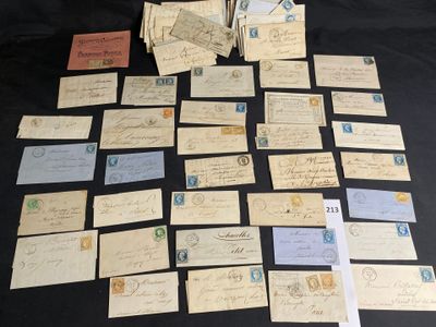 a lot of old letters on a black table