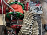 a lot of tools that are sitting on the floor