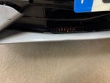 a close up of the front bumper of a car